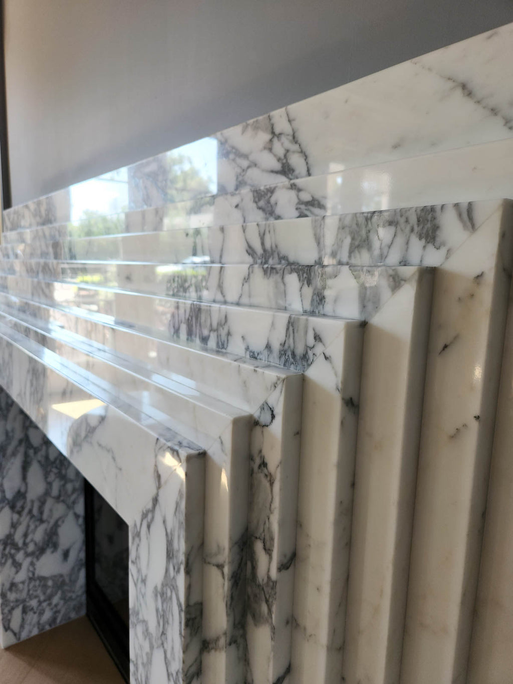 Arabescato Marble La Gigi 72 Luxury Fireplace Surround - Three Quarter View with Brass Firebox | Stonegems