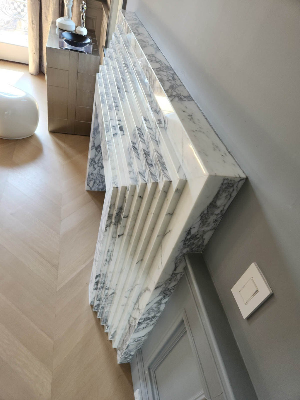 Arabescato Marble La Gigi 72 Fireplace - Close-Up Corner Detail of Stepped Mantel and Fluted Leg | Stonegems